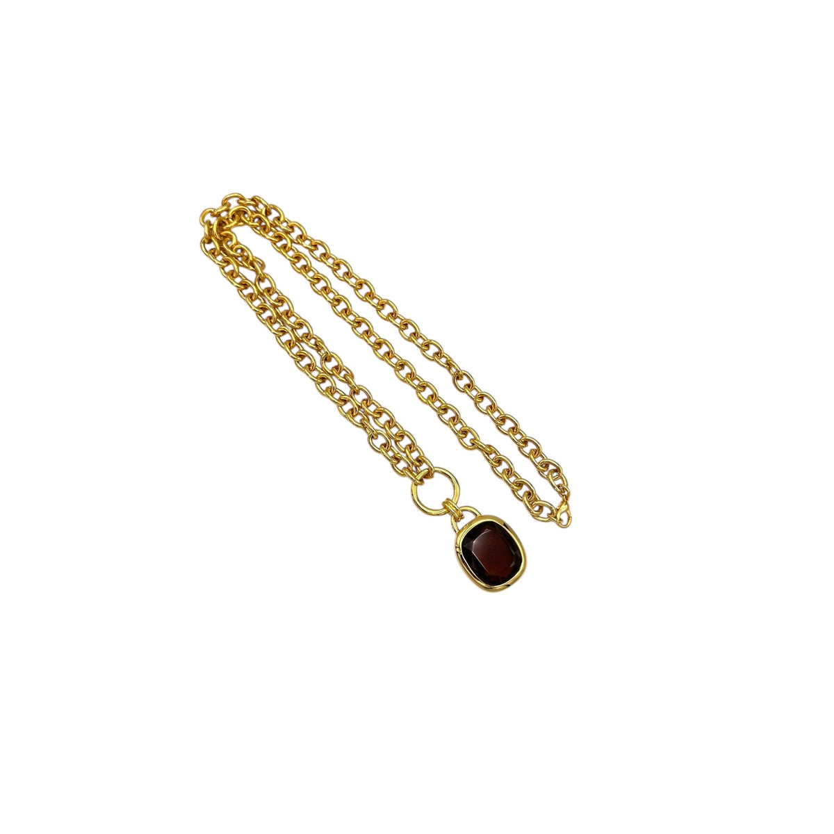 Vintage Joan Rivers gold link necklace with smoky brown topaz glass pendant displayed on white background.