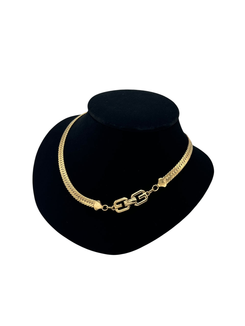 Side view of Givenchy Gold Herringbone Chain Vintage Necklace on black bust.