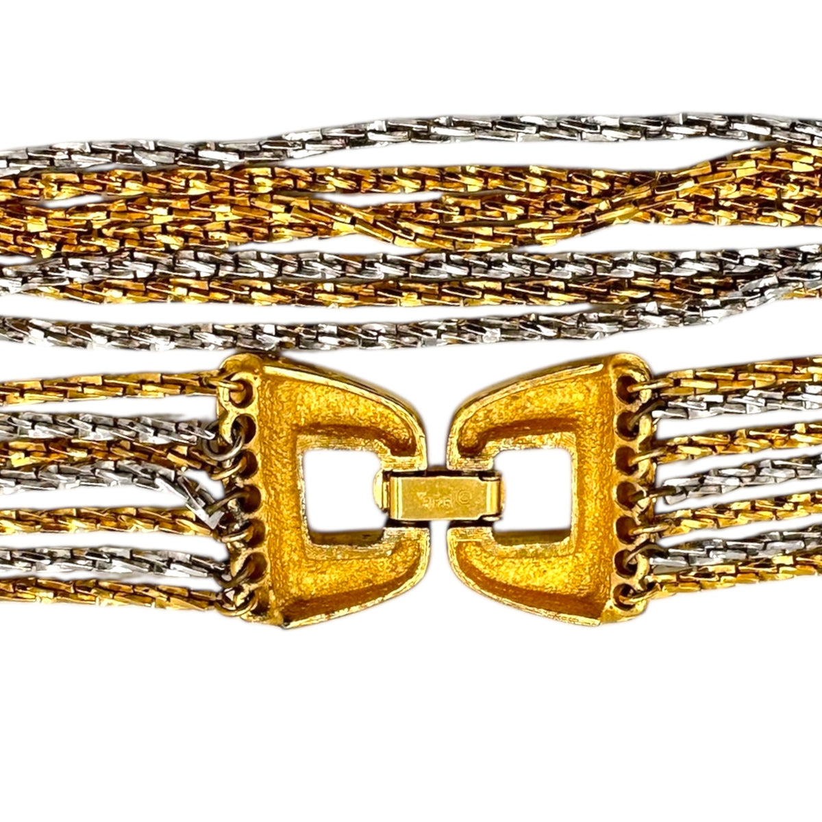 Back of clasp of Crown Trifari signed vintage gold and silver multi-strand chain necklace on white background.