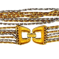 Back of clasp of Crown Trifari signed vintage gold and silver multi-strand chain necklace on white background.
