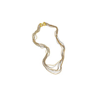 Crown Trifari signed vintage gold and silver multi-strand chain necklace on white background.
