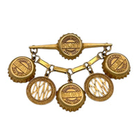 Brooches & PinsDonna Karan DKNY Bottle Cap Dangle Charm Brooch