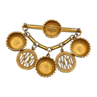 Brooches & PinsDonna Karan DKNY Bottle Cap Dangle Charm Brooch