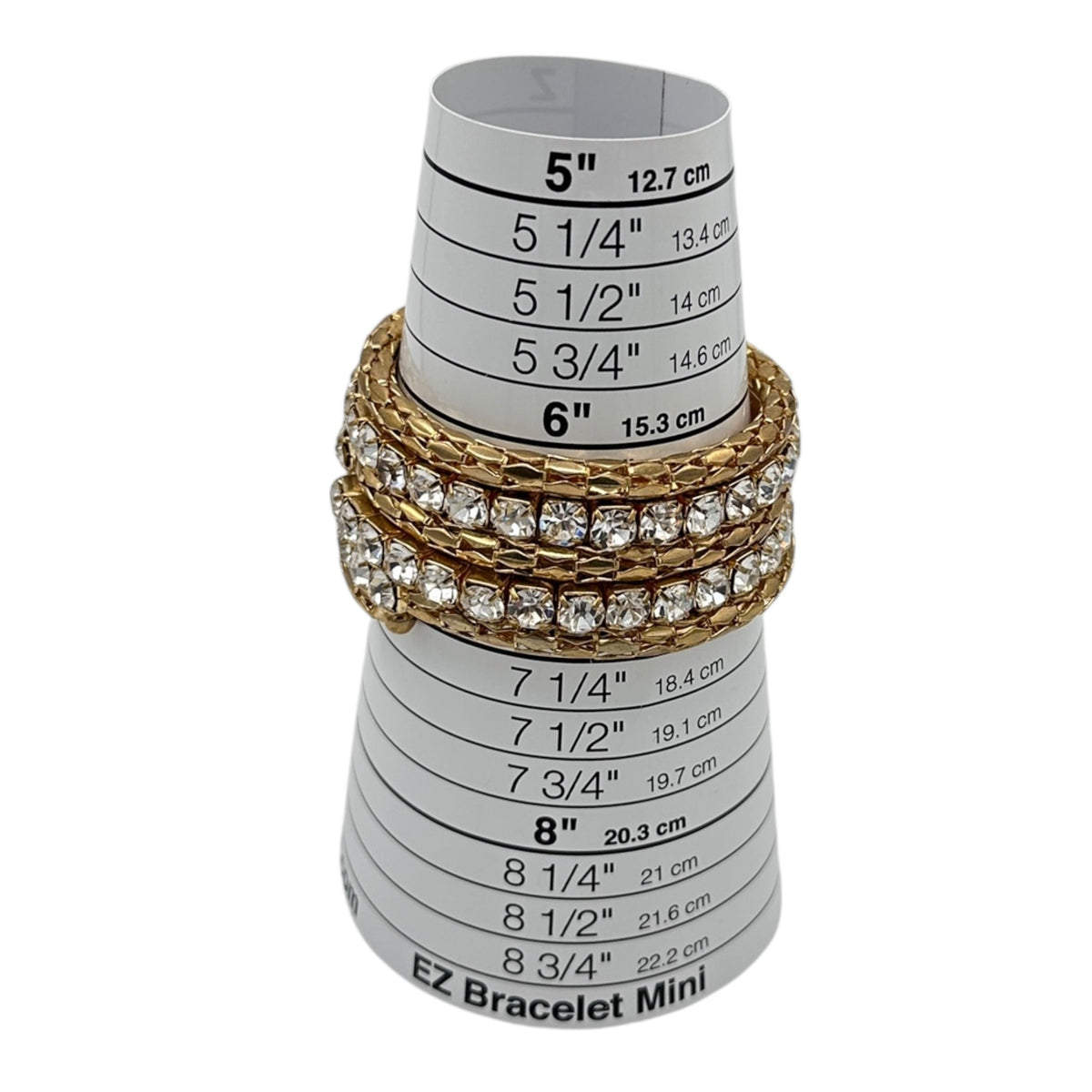 Gold mesh bracelet on bracelet sizer.