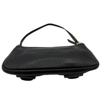 Bottom view of Vintage Michael Kors black pebbled leather Roadie bag with gold hardware and dual front pockets displayed on white background.