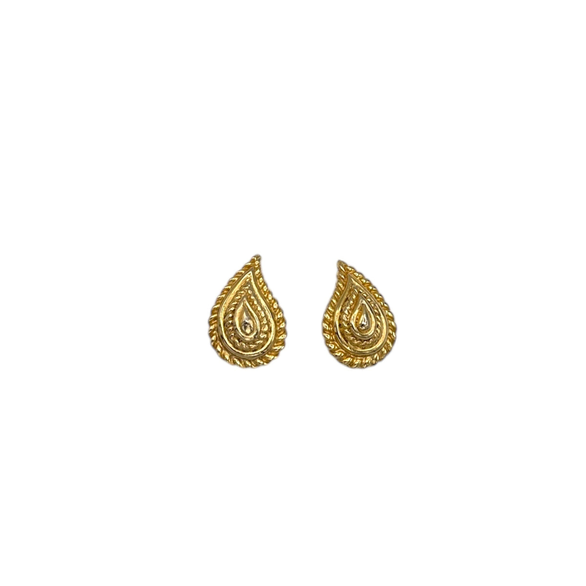 Vintage Mimi di N gold paisley clip-on earrings with textured teardrop design displayed on white background.