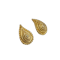 Side view of Vintage Mimi di N gold paisley clip-on earrings with textured teardrop design displayed on white background.