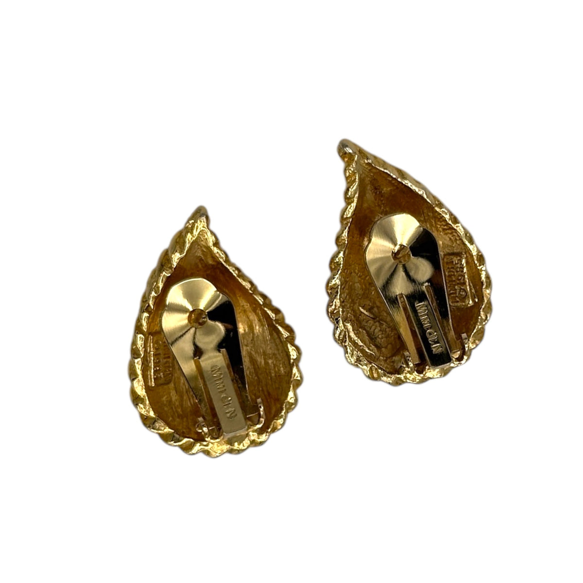 Back view of Vintage Mimi di N gold paisley clip-on earrings with textured teardrop design displayed on white background.