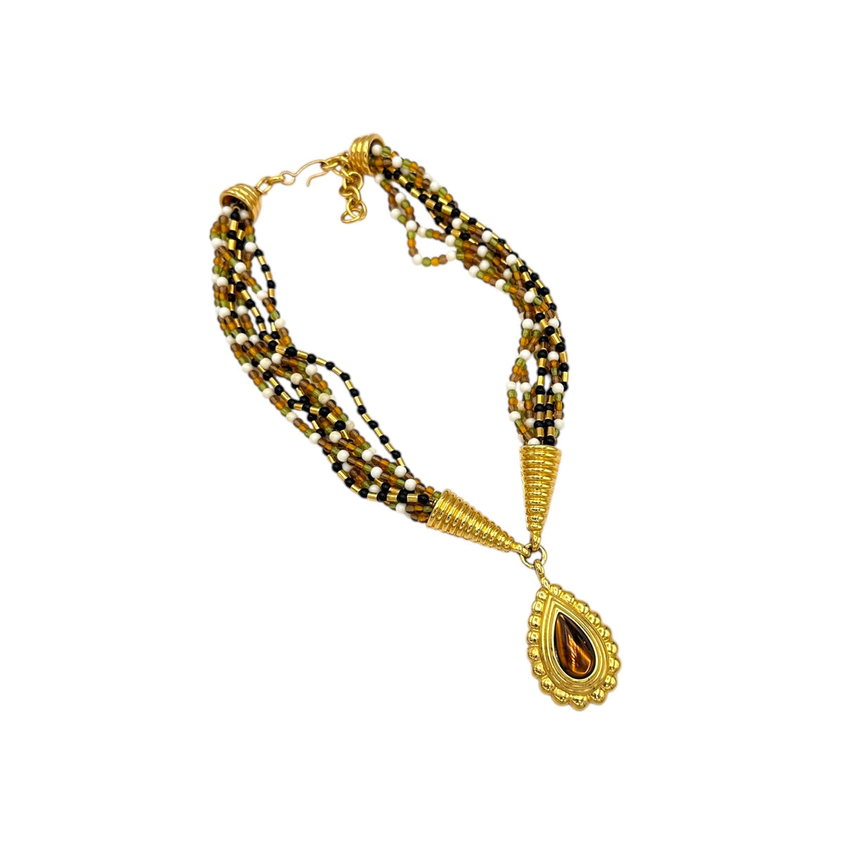 Monet vintage gold multi-strand beaded necklace with a brown teardrop pendant and gold accents on white background.