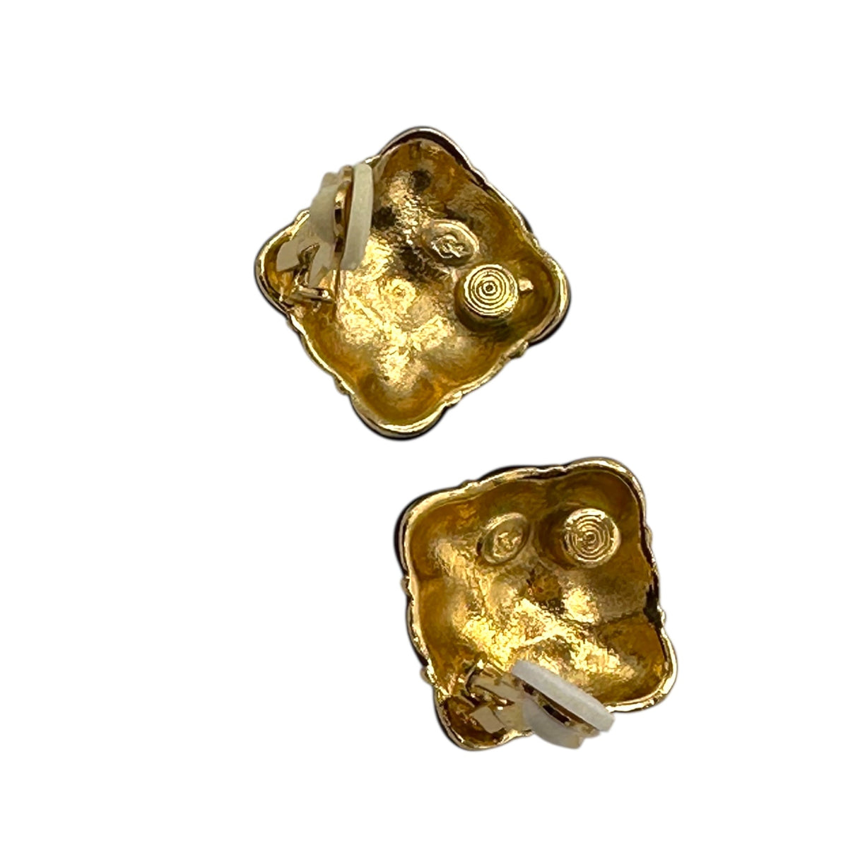 Back view with clips up of Vintage Premier Design jewel-tone enamel clip-on earrings with gold grid design in red, green, and amber colors – 1980s statement jewelry shown on white background.