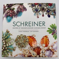 View of Scheiner brooch on the book Schreiner Master of Twentieth-century costume jewelry.