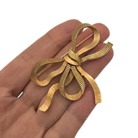 Brooches & PinsVintage 1960s Trifari Gold Textured Flowing Bow Brooch
