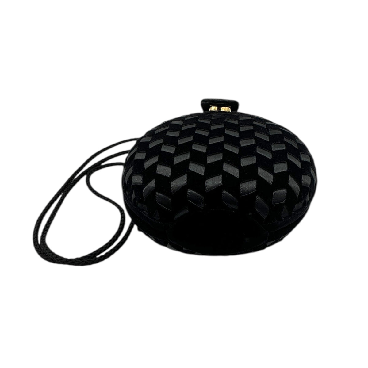 Bottom view of Vintage black round velvet and satin weave small crossbody handbag with cord strap displayed on white background.
