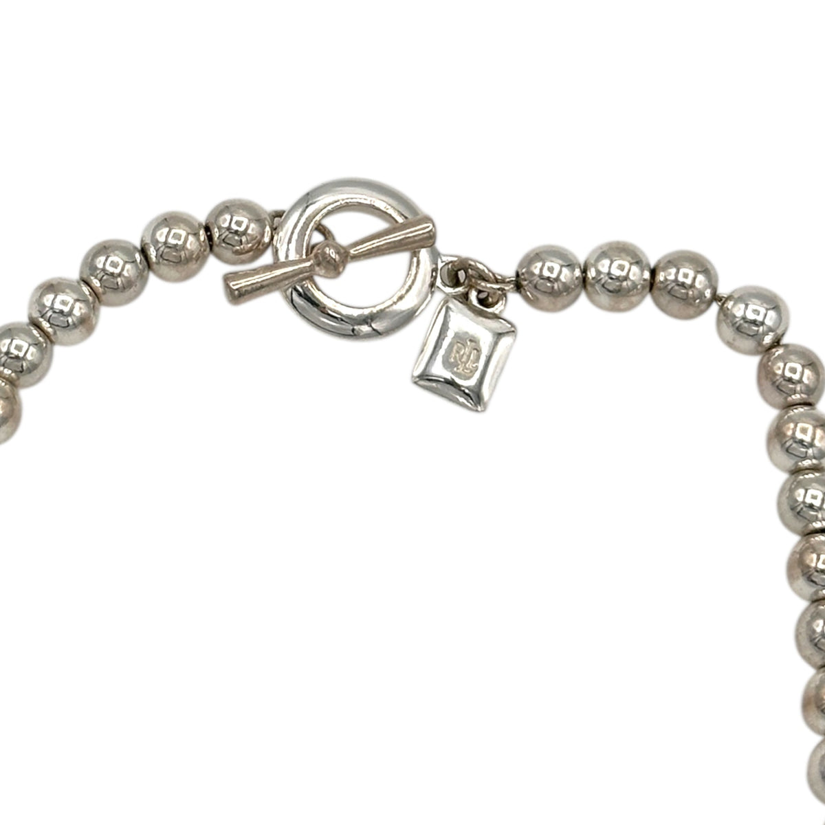 Necklaces & PendantsVintage Ralph Lauren Silver Plated Graduated Bead Necklace with Toggle Closure