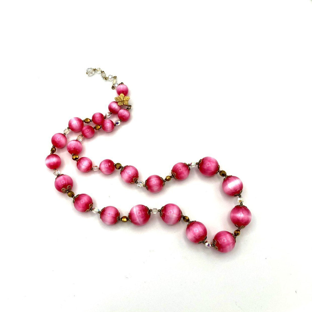 Vintage necklace with round pink cat’s eye beads, faceted crystals, and gold-tone accents - 24 Wishes Vintage Jewelry
