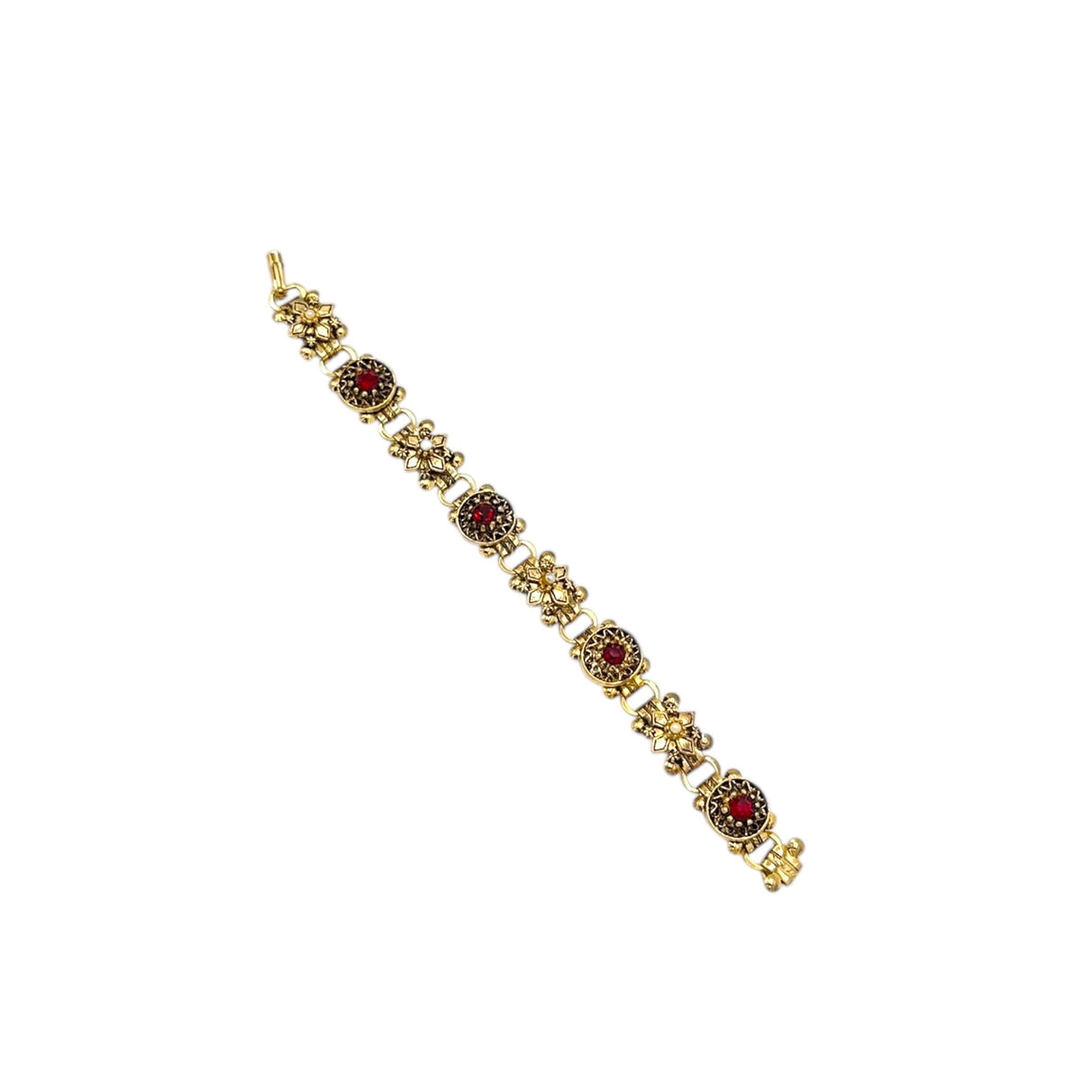 Vintage Victorian Revival gold tone book chain bracelet with ruby red glass cabochon centerpiece displayed on white background.