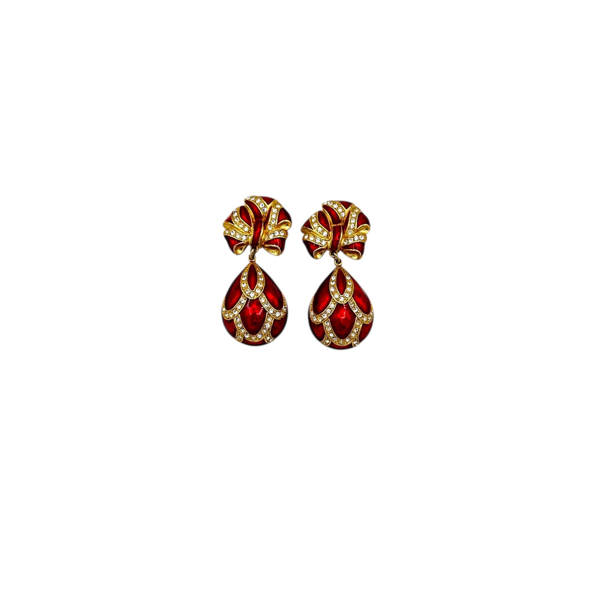 Whiting & Davis vintage red enamel bow and teardrop rhinestone dangle clip-on earrings, gold-tone statement jewelry on white background.
