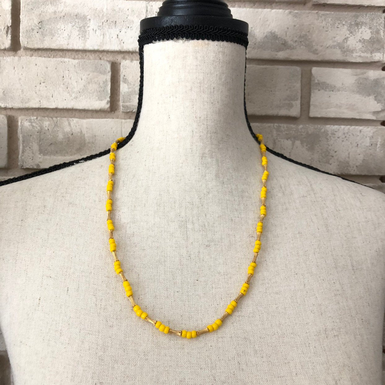 Long yellow beaded necklace discount