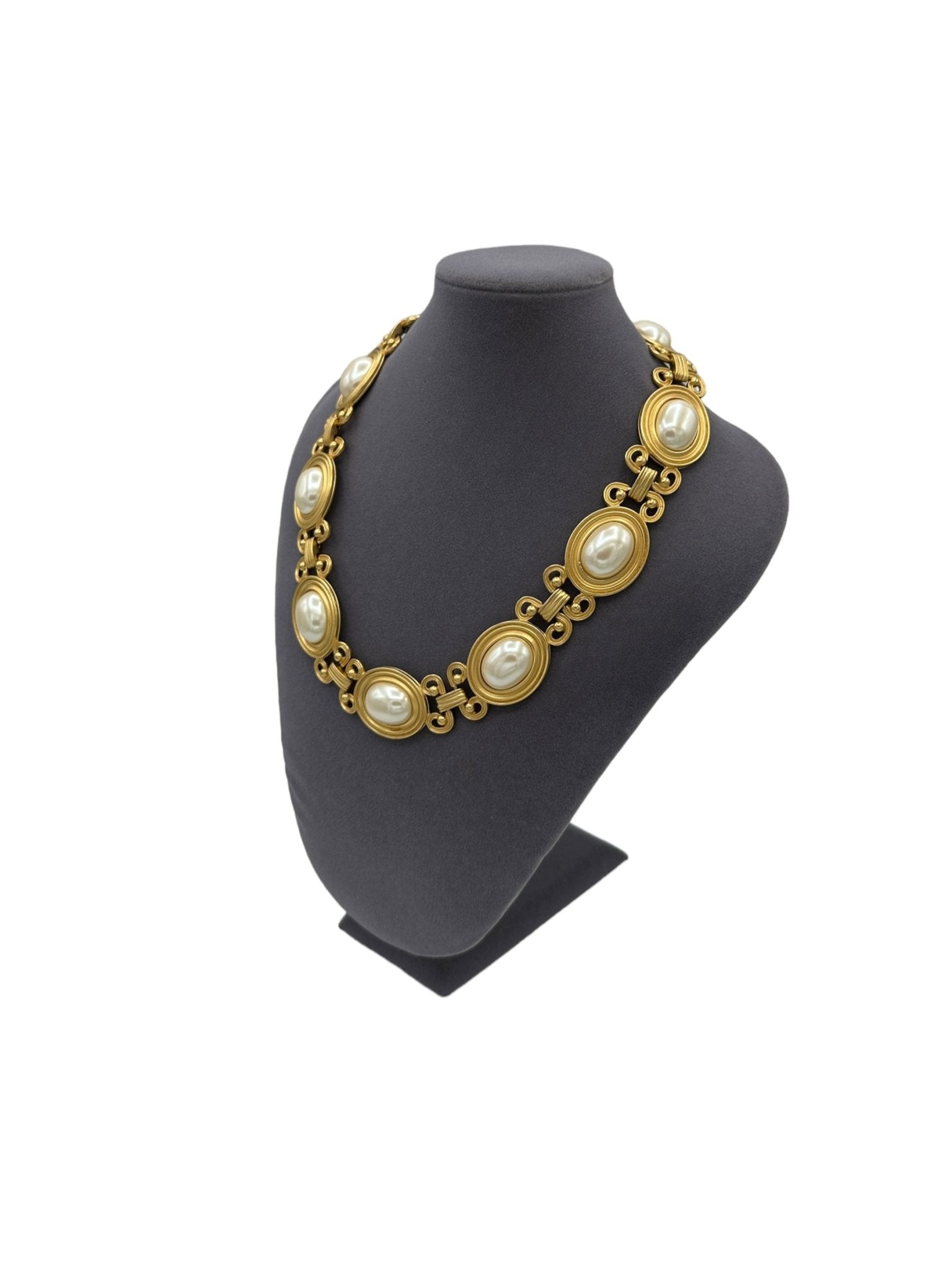 A boxed Napier collar necklace, a further faux pearl necklace and a bangle,  a ladies compendium, a p
