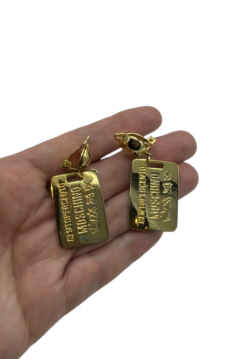 Redwall MOSCHINO Vintage Gold Dog Tag Dangle Clip-On Earrings - 24 Wishes Vintage Jewelry